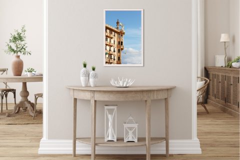 The white statue of an angel posing on top of a gorgeous edifice. Photo captured by Travel Photographer Scott Allen Wilson.