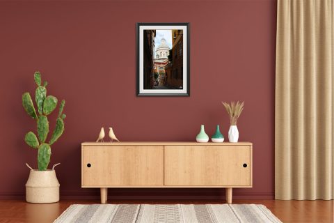 A grand dome towers over the bright orange facades. Photo captured by Travel Photographer Scott Allen Wilson.