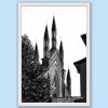 Black and white framed art print of gothic church spires rising above historic Pavia, Italy.