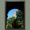 Travel photography print of Pavia with vibrant greenery, blue sky, and historic brick architecture.