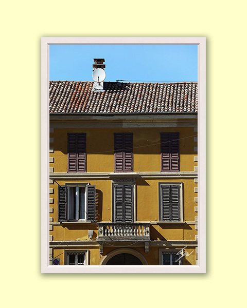 Travel framed photography displayed in a modern interior with warm minimalist decor.