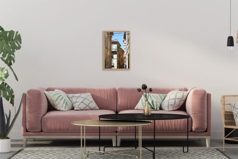 Fine art travel photograph capturing layered architecture, balconies, and overhead power lines in Pavia.