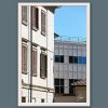 Framed travel art print contrasting historic and modern architecture in Pavia, Italy.
