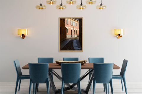 Fine art travel photograph capturing soft light, shadows, and quiet streets in Pavia.