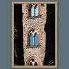Fine art framed travel photography of historic Italian windows partially hidden by shadow.