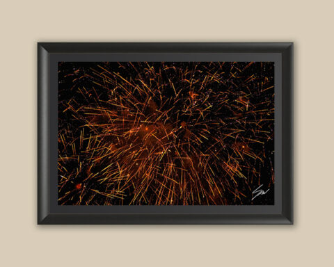 Framed fine art print featuring golden fireworks lighting up the night sky over Recco, Italy.