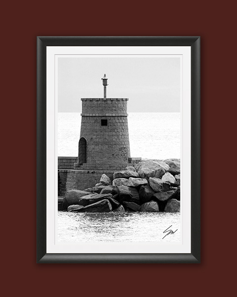 Coastal fine art print featuring a lighthouse on the Italian Riviera in monochrome, celebrating maritime architecture and minimalist seaside landscapes.
