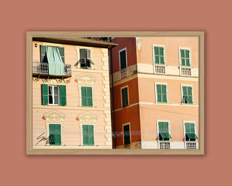 Framed wall art capturing the architectural details of historic buildings in the Italian Riviera.