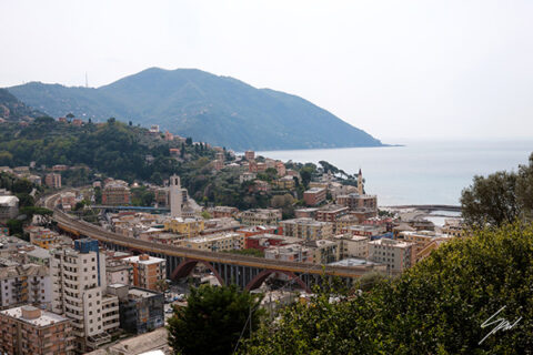 Fine art landscape photograph of Recco on the Italian Riviera, featuring the town, coastline, mountains, and the Ligurian Sea.