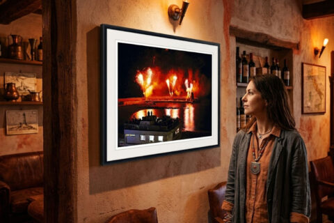 Fine art travel photograph of fireworks illuminating Recco Harbour, Italy, with reflections across the Mediterranean Sea.